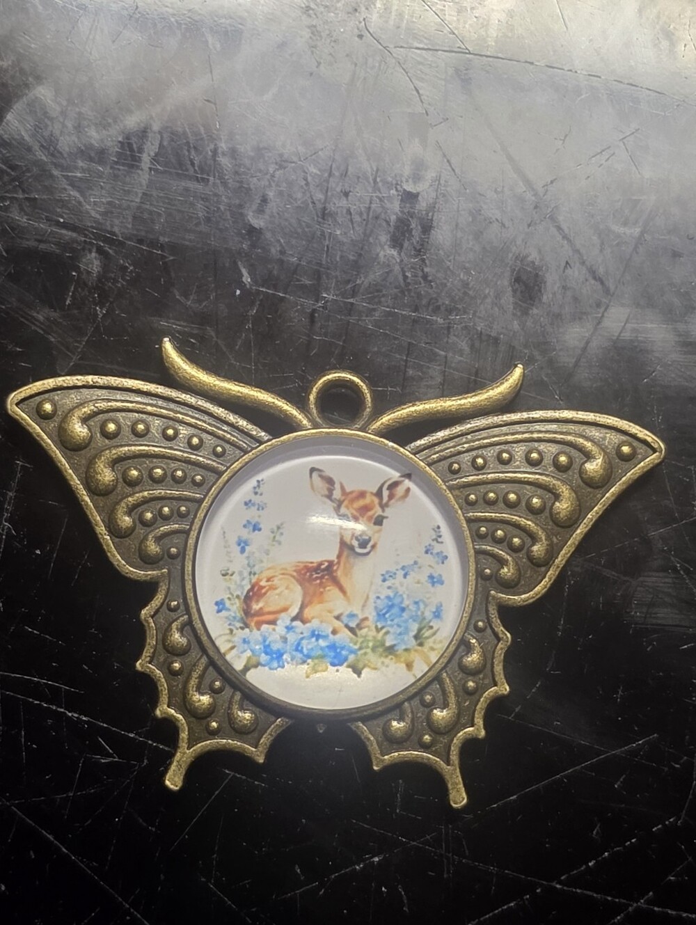 Bronze Tone Butterfly Shaped Pendant With Deer Cabochon Inside